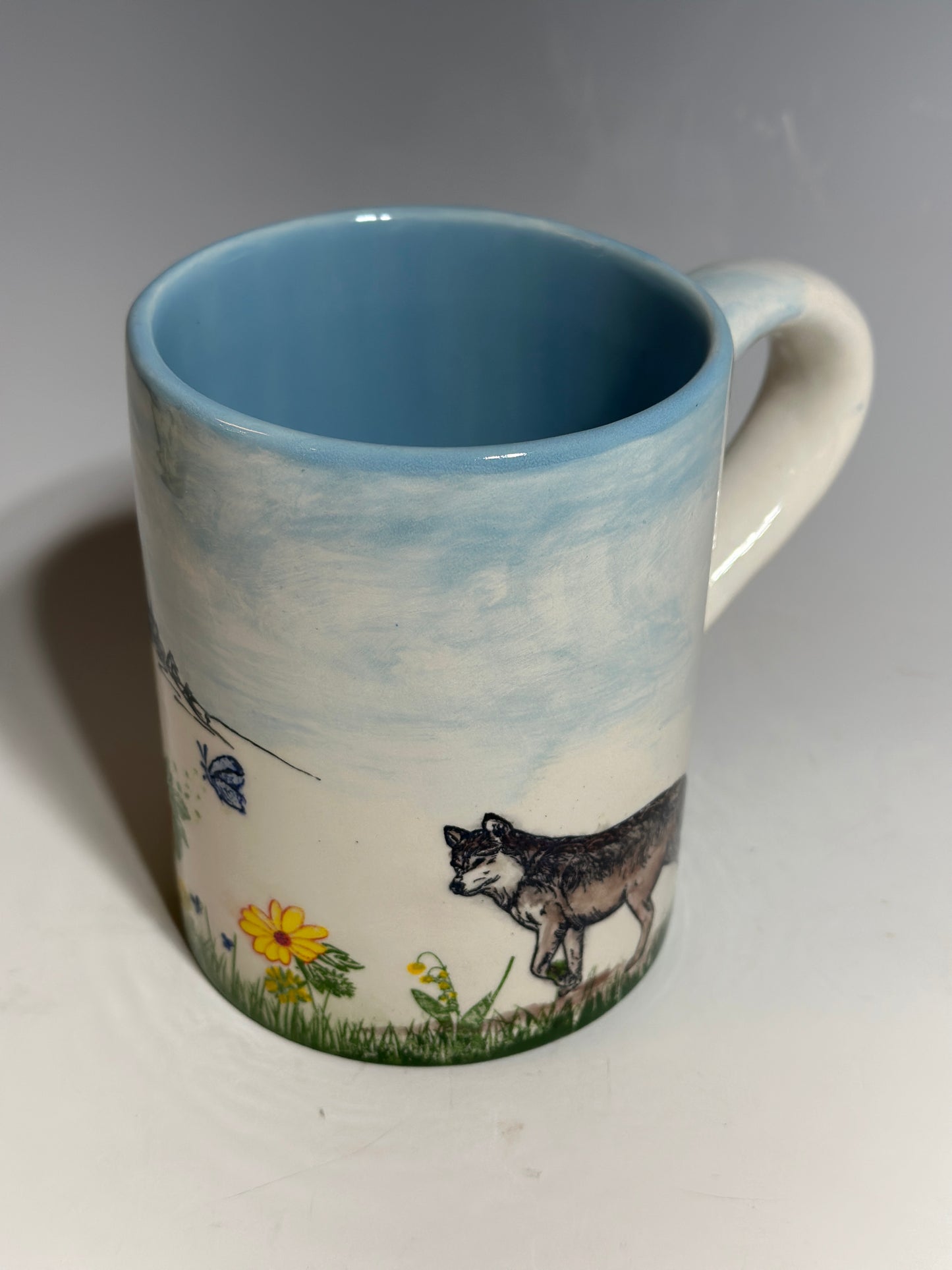 The Wolf and the Bunny Mountain Scene Mug