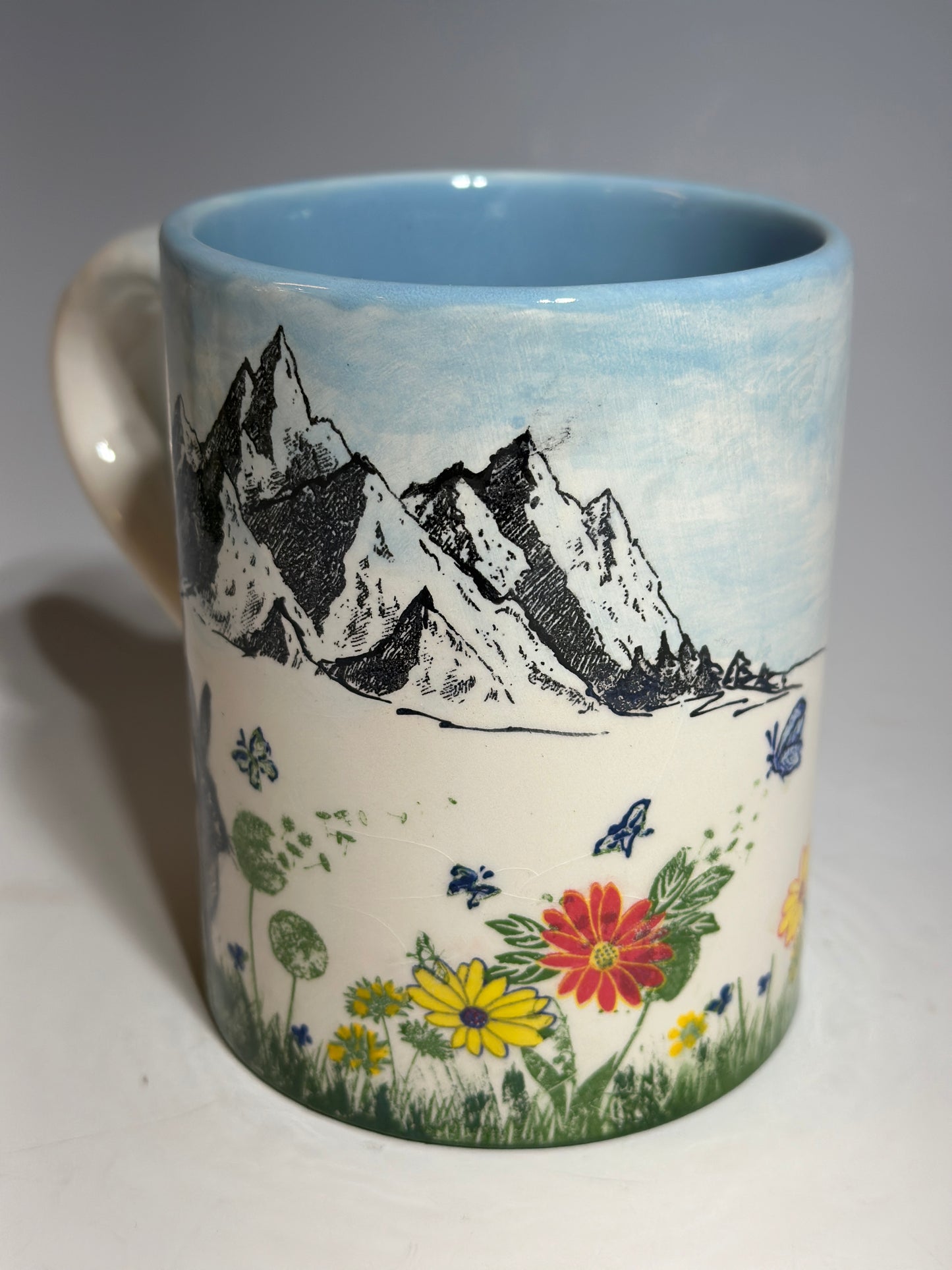 The Wolf and the Bunny Mountain Scene Mug